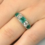 An emerald and old-cut diamond five-stone ring.