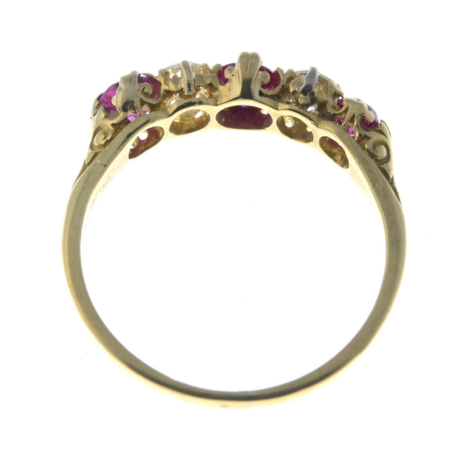 A ruby and diamond five-stone ring.Estimated total diamond weight 0.10ct.Stamped 18ct.Ring size K. - Image 2 of 3