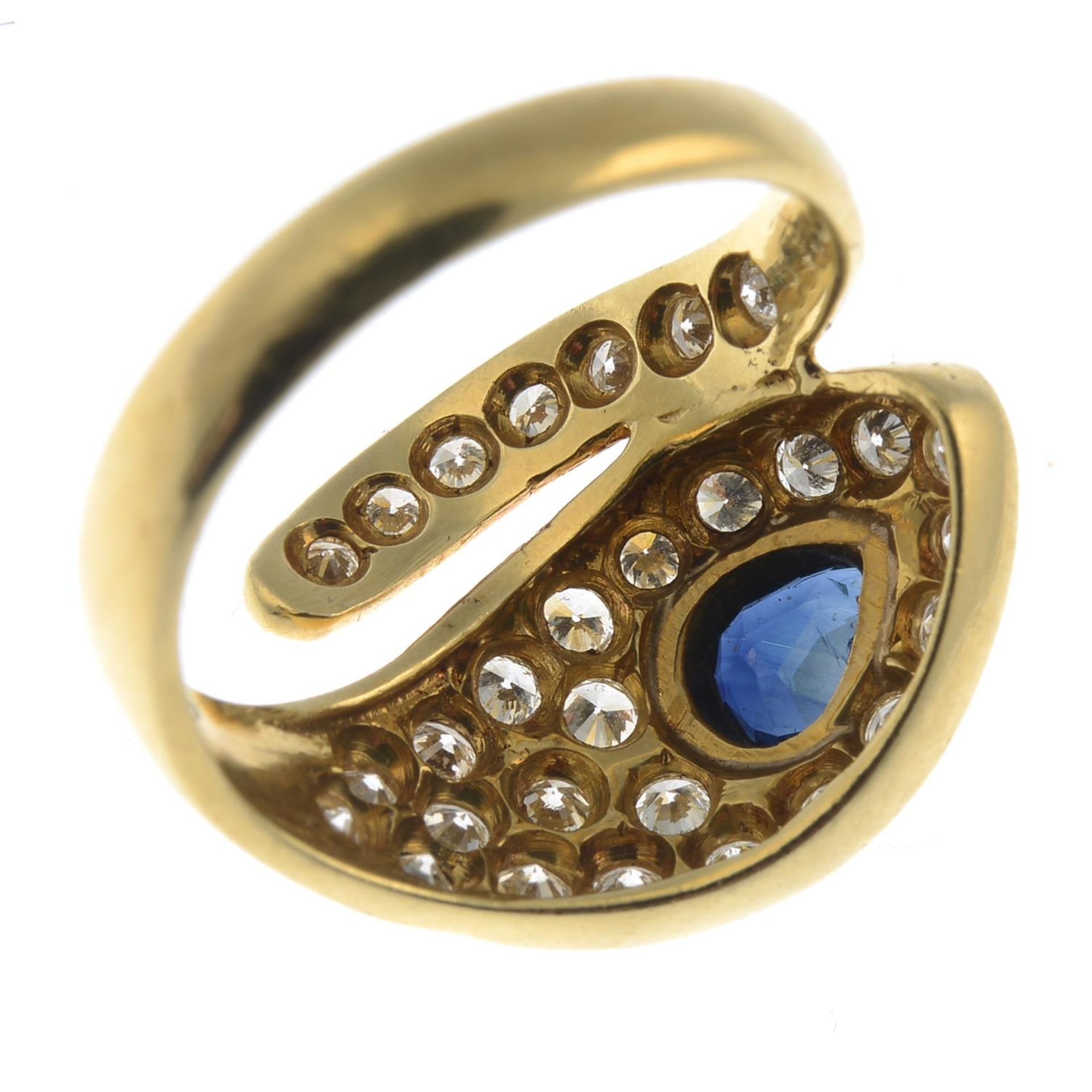 A sapphire and diamond snake ring.Estimated total diamond weight 0.65ct.Ring size L. - Image 3 of 3