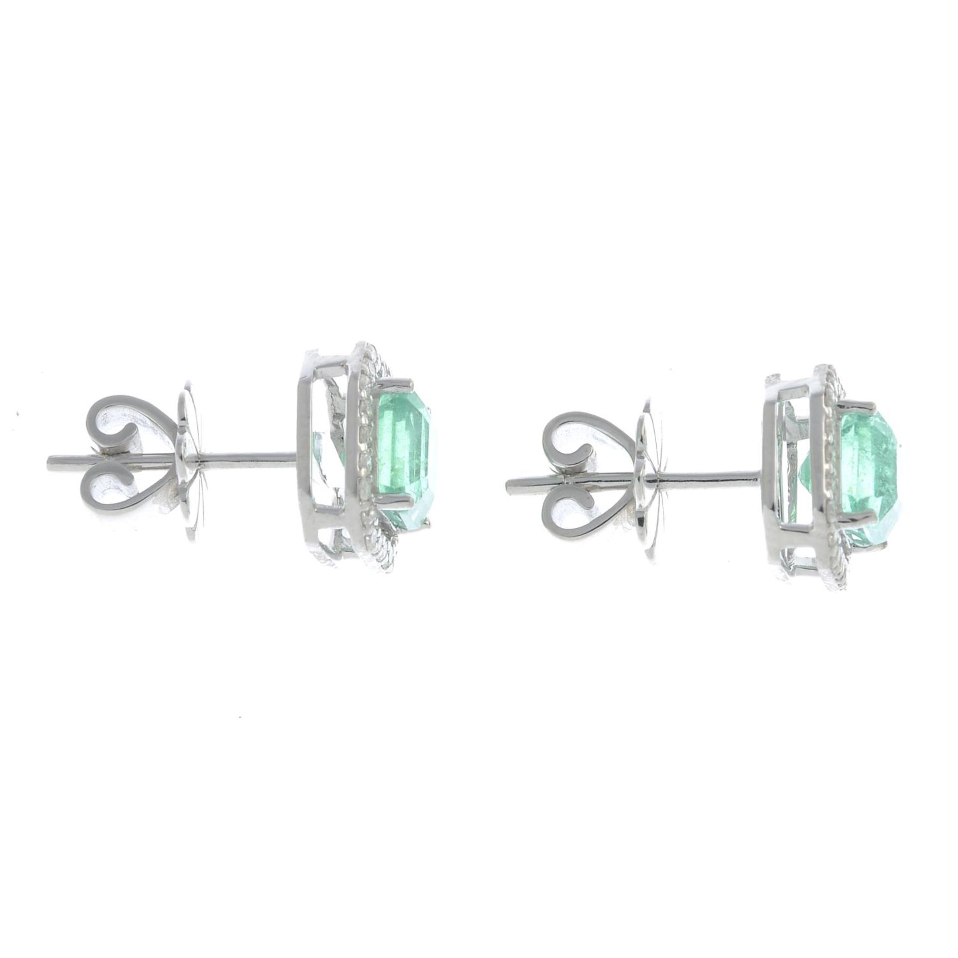 A pair of emerald and brilliant cut diamond cluster earrings.Estimated total diamond weight - Image 2 of 2