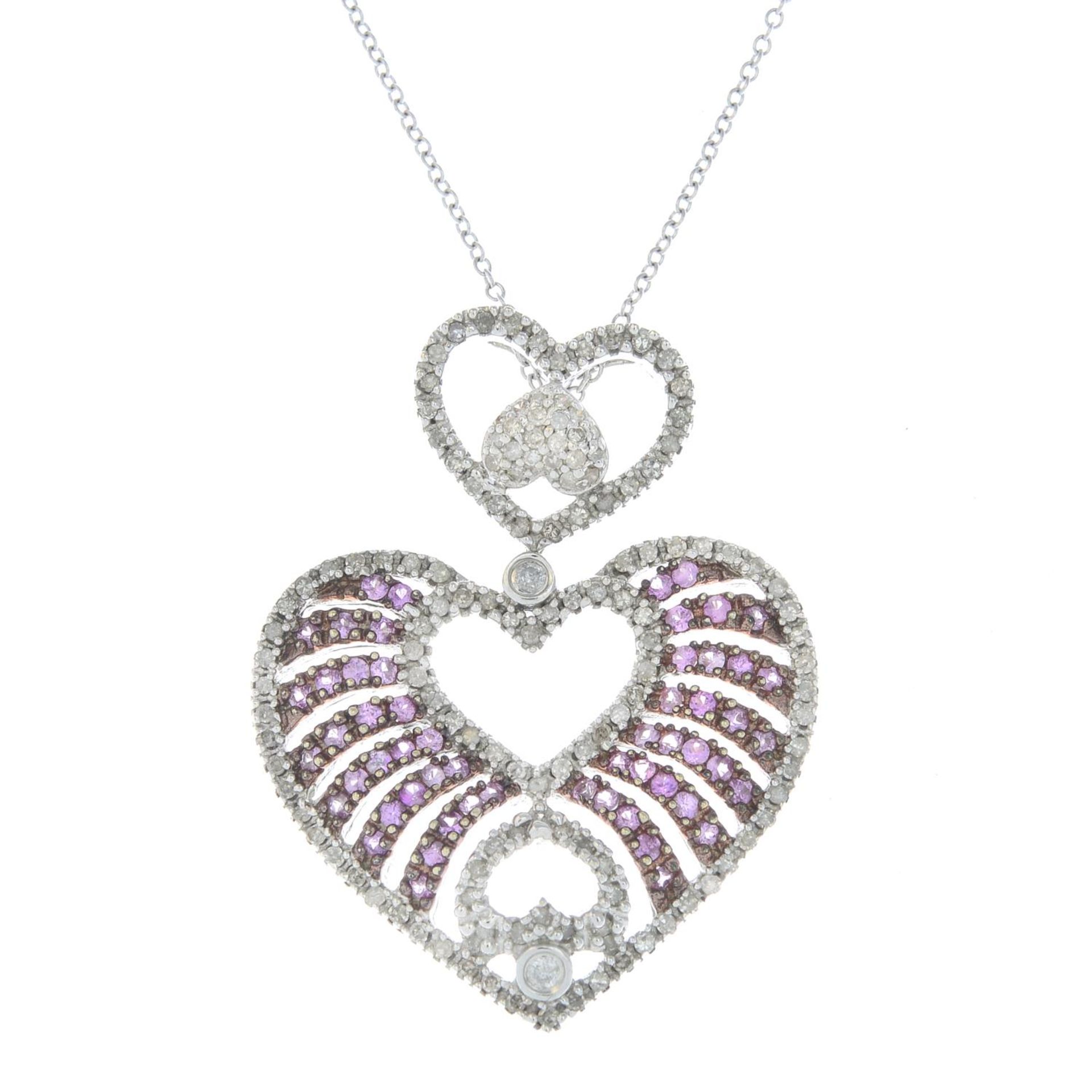 A pink sapphire and diamond heart pendant,