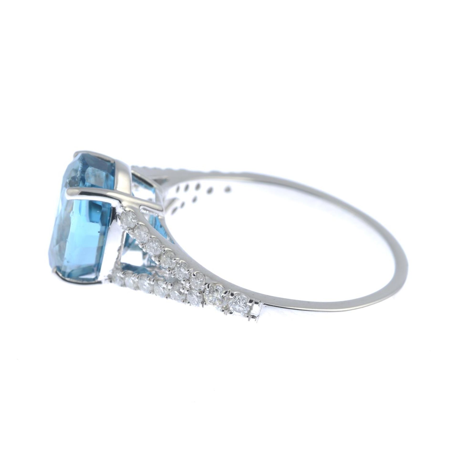 A blue zircon and brilliant-cut diamond dress ring.Zircon calculated weight 3.31cts, - Image 2 of 3