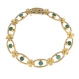 An early 20th century 15ct gold turquoise floral bracelet.