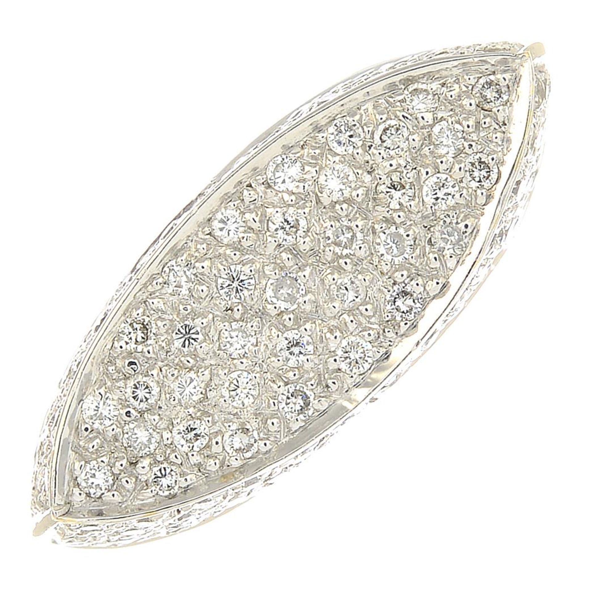 An 18ct gold pave-set diamond dress ring.Total diamond weight 0.74ct,