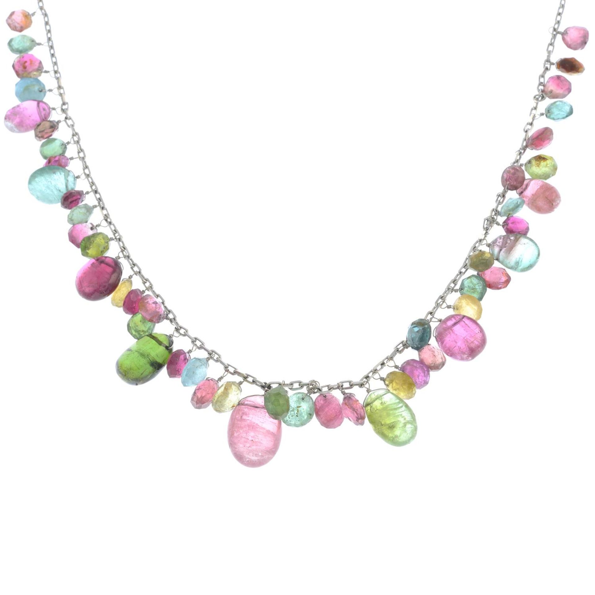 A vari-hue tourmaline necklace.Tourmalines include pink,