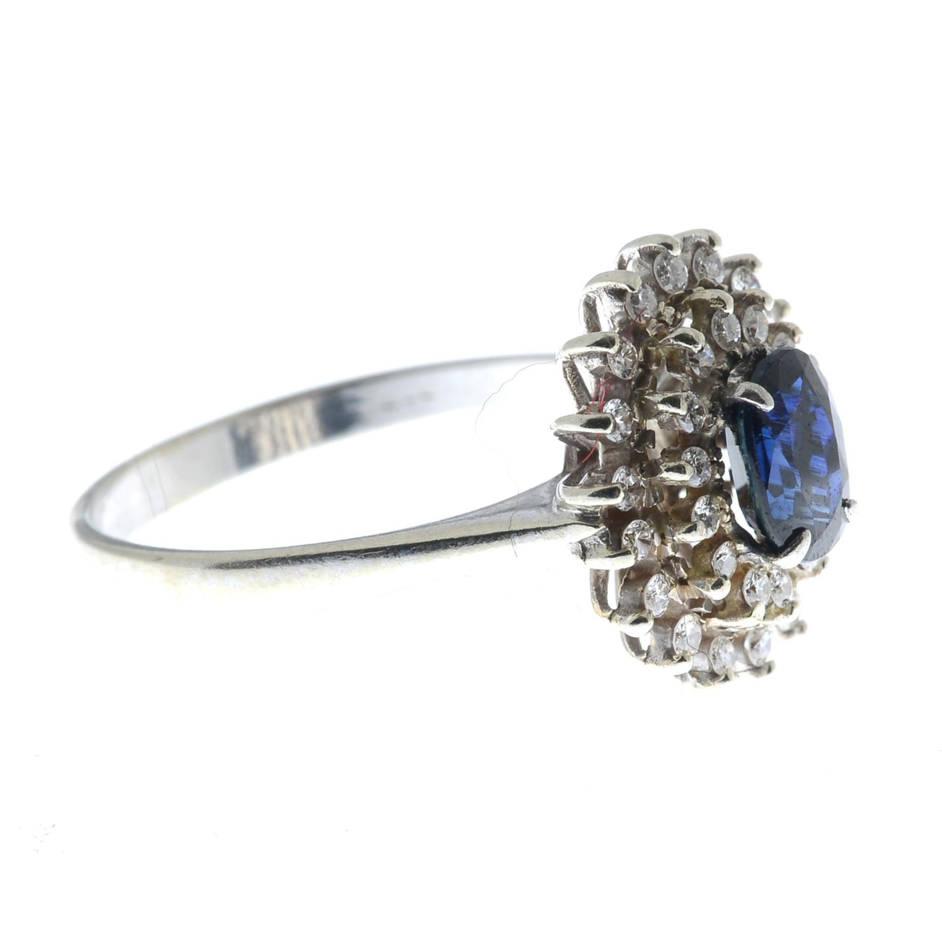 An 18ct gold sapphire and diamond cluster ring.Estimated total diamond weight 0.35ct.Import marks - Image 3 of 3