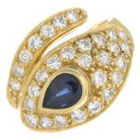 A sapphire and diamond snake ring.Estimated total diamond weight 0.65ct.Ring size L.