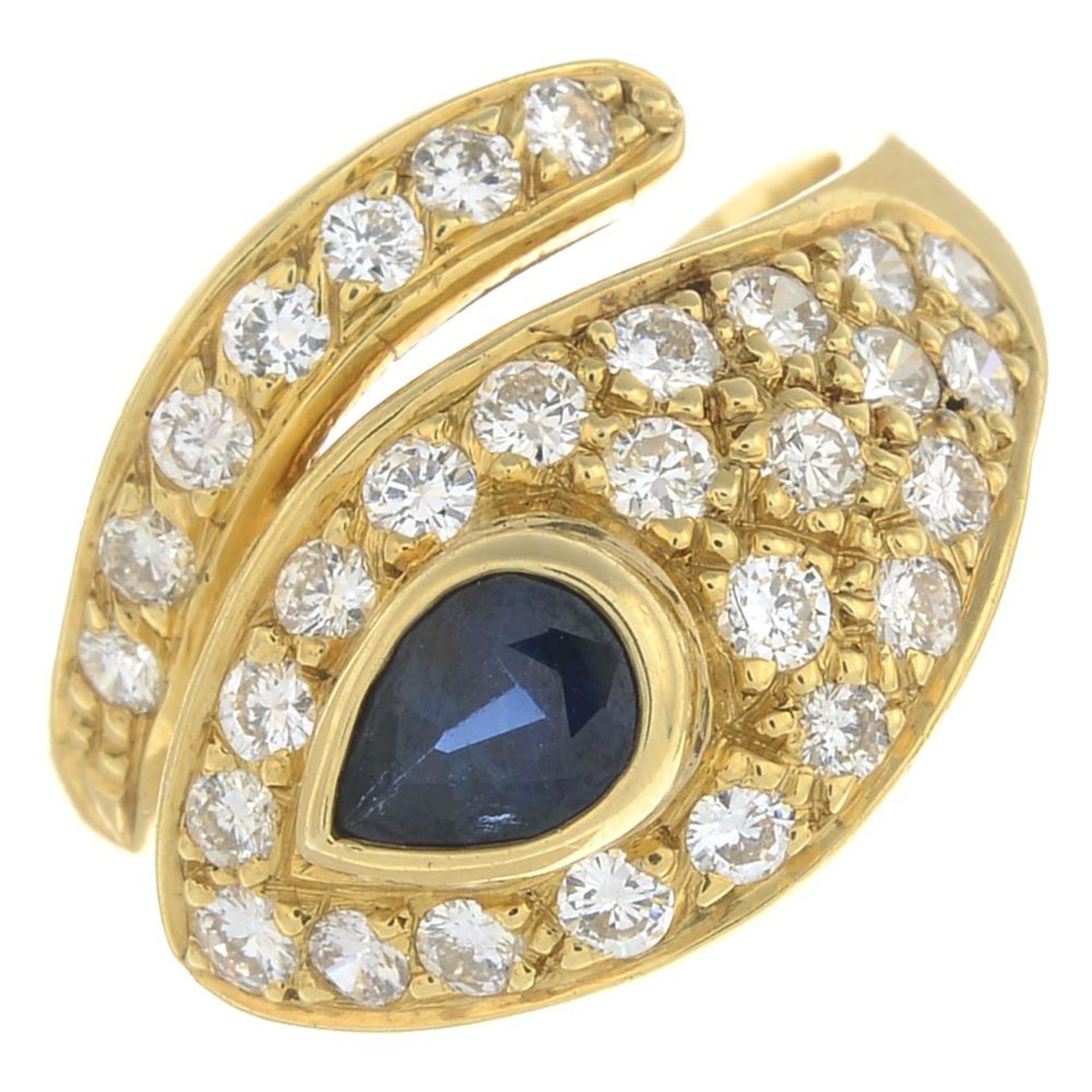 A sapphire and diamond snake ring.Estimated total diamond weight 0.65ct.Ring size L.