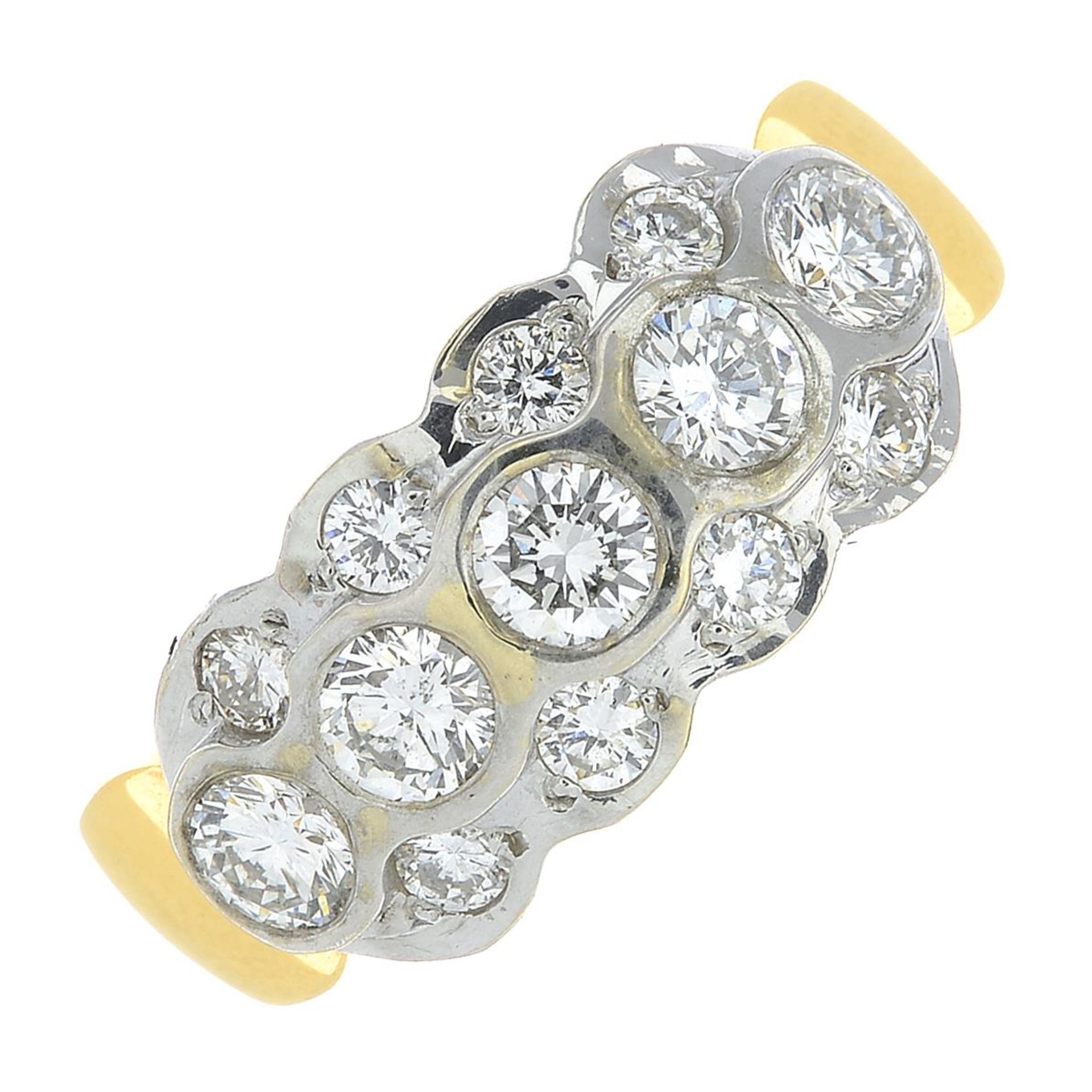 An 18ct gold brilliant-cut diamond dress ring.Estimated total diamond weight 1.10cts,