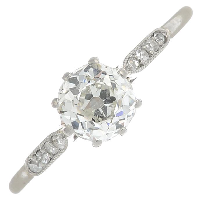 An early 20th century palladium old-cut diamond single-stone ring.Estimated diamond weight 0.50ct,