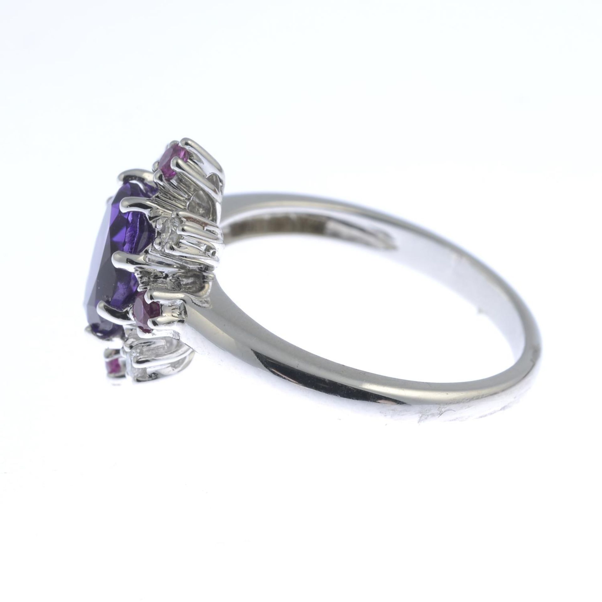 An 18ct gold amethyst, ruby and brilliant-cut diamond cluster ring. - Image 2 of 3