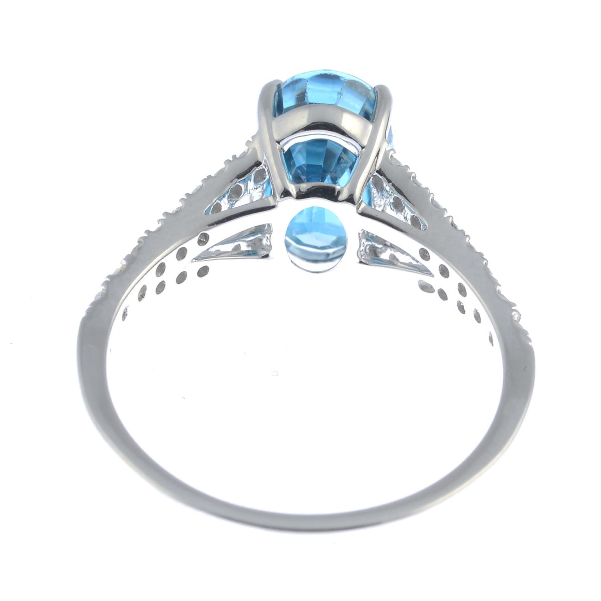 A blue zircon and brilliant-cut diamond dress ring.Zircon calculated weight 3.31cts, - Image 3 of 3