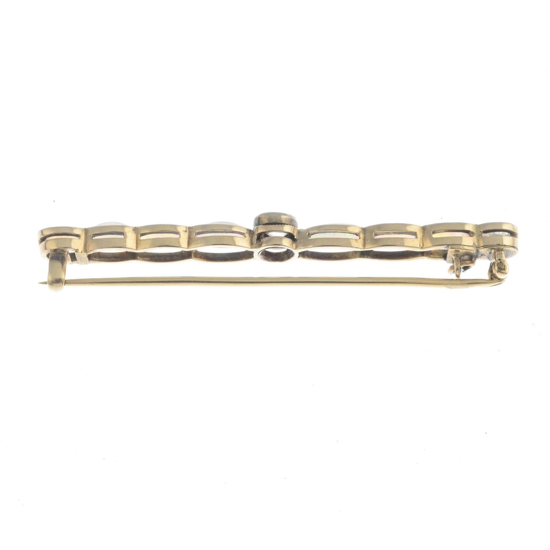 An early 20th century gold opal and diamond bar brooch. - Image 2 of 2