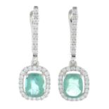 A pair of emerald and brilliant cut diamond earrings.Total emerald calculated weight 2.05cts,