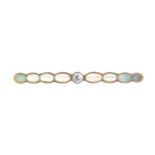 An early 20th century gold opal and diamond bar brooch.