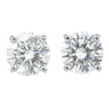 A pair of 18ct gold brilliant-cut diamond stud earrings.