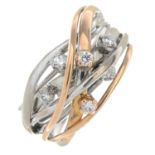 An 18ct gold diamond dress ring.Estimated total diamond weight 0.25ct,
