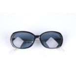 LULU GUINNESS - a pair of polarized sunglasses.