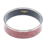 HERMÈS - an enamel bangle.