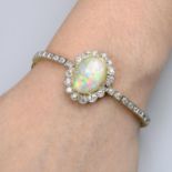 An early 20th century platinum and 18ct gold opal and old-cut diamond bracelet.Estimated dimensions