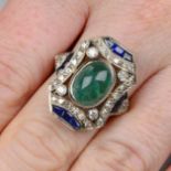 An emerald cabochon,