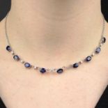 An 18ct gold sapphire and brilliant-cut diamond necklace.Sapphire calculated total weight 7cts,