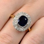 A cushion-shape sapphire and single-cut diamond cluster ring.Sapphire calculated weight 2.21cts,