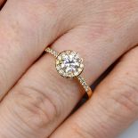 An 18ct gold diamond cluster ring.