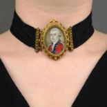 An early 19th century gold portrait miniature clasp of a Redcoat officer,