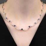 A heart-shape sapphire and diamond necklace,
