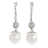 A pair of cultured pearl and diamond drop earrings.