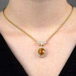 An 18ct gold orange sapphire and vari-cut diamond pendant,