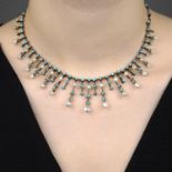 A late Victorian silver and gold natural pearl and turquoise fringe necklace.