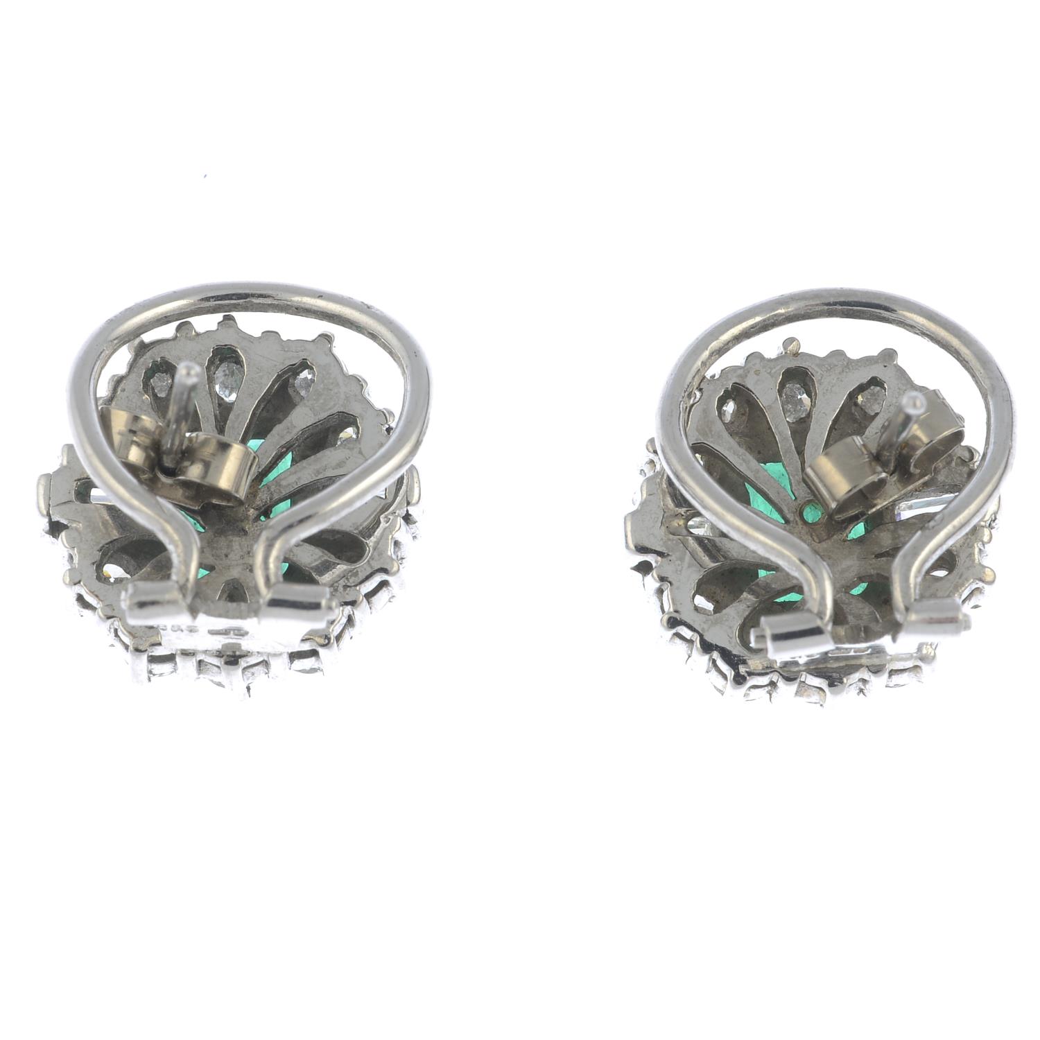 A pair of 18ct gold emerald and vari-cut diamond cluster earrings.Estimated total diamond weight - Image 2 of 3