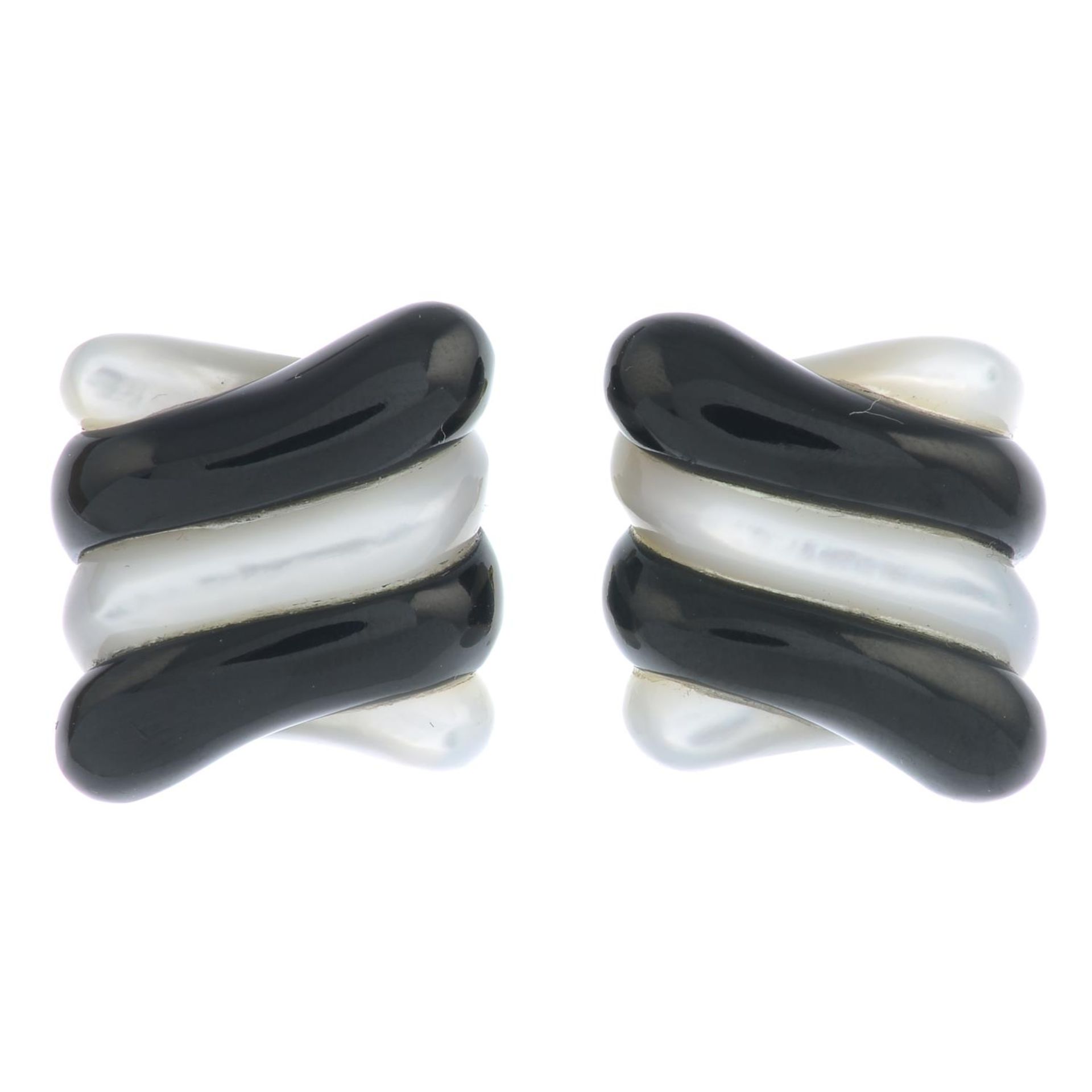 A pair of carved mother-of-pearl and black jade earrings, by Angela Cummings.Stamped 750. - Image 3 of 3