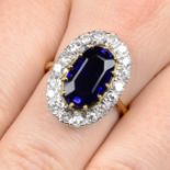 An 18ct gold sapphire and diamond cluster ring.