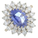 A Madagascan sapphire and brilliant-cut diamond floral cluster ring.