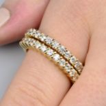 Two 18ct gold brilliant-cut diamond eternity rings.Estimated total diamond weight 3.35cts,