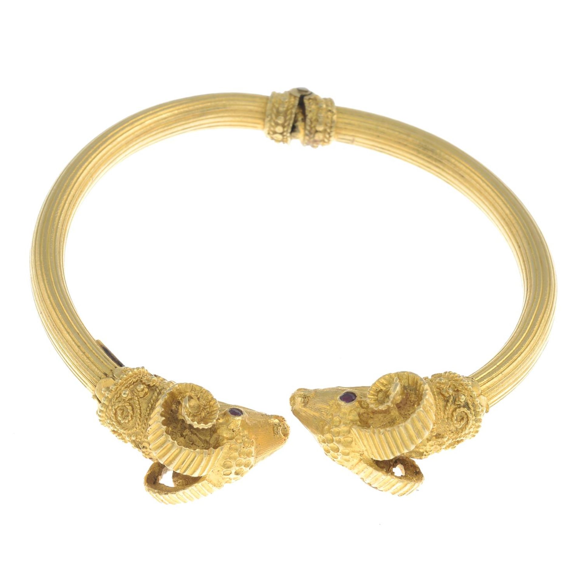 A ram's head hinged bangle, with ruby eyes, by Ilias Lalaounis.Stamped 750. - Image 5 of 5