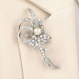 A mid 20th century 18ct gold pearl and diamond floral spray brooch.