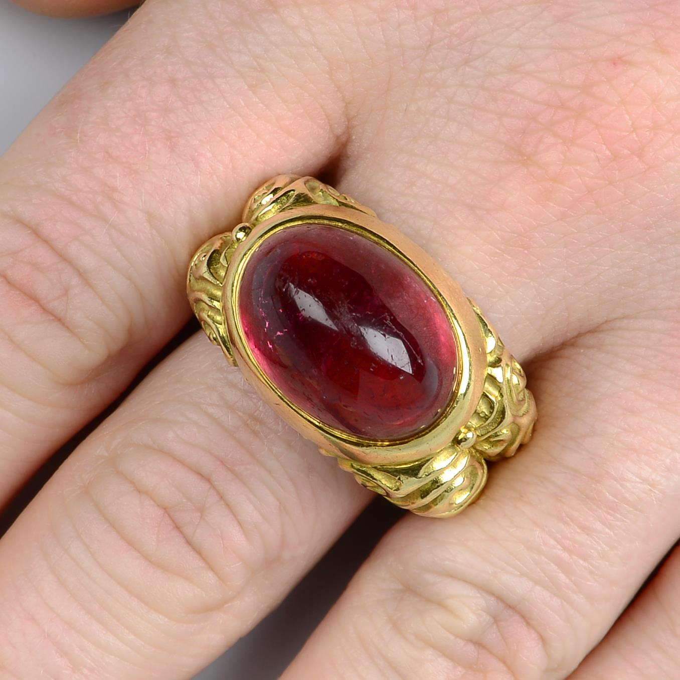 An 18ct gold pink tourmaline dress ring,