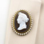 A late Victorian 18ct gold onyx cameo brooch,