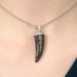 An 18ct gold diamond and black diamond 'Horn' pendant,