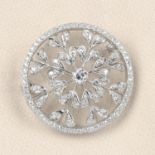 A diamond openwork floral brooch.Principal diamond estimated weight 0.35ct,