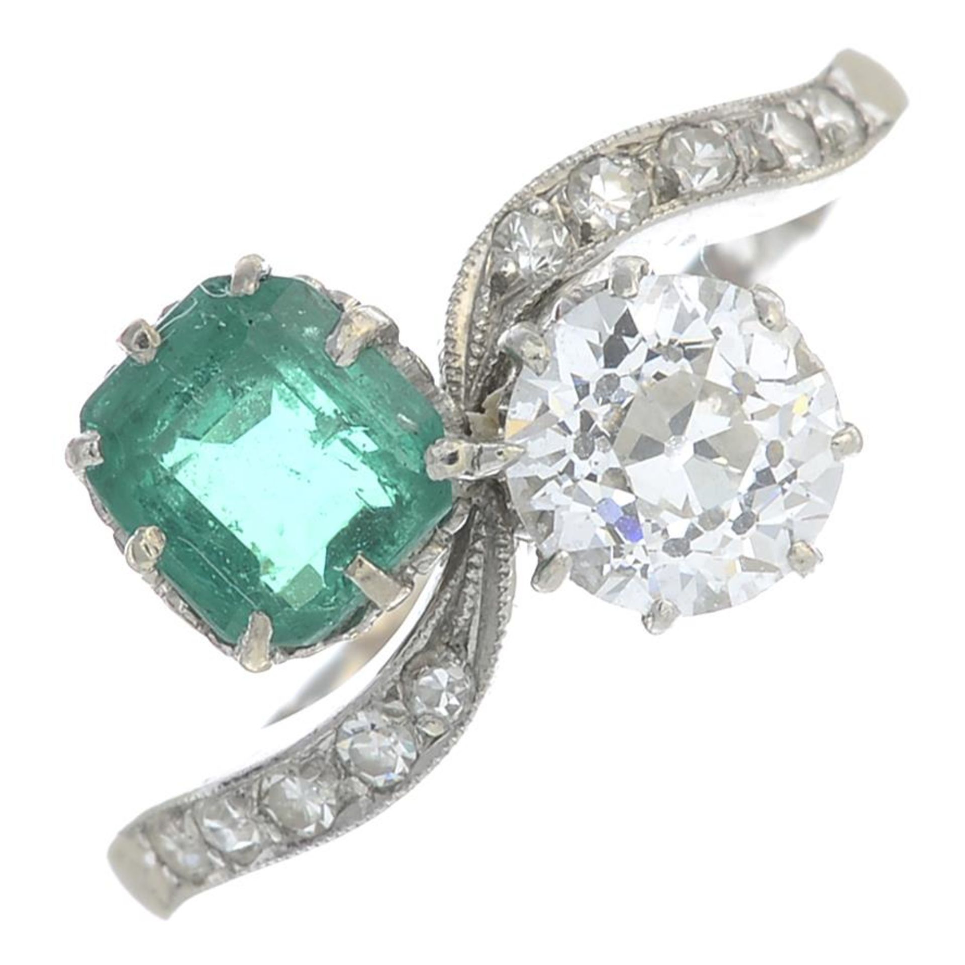 An early 20th century platinum emerald and old-cut diamond two-stone crossover ring, - Image 3 of 4