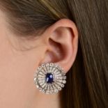 A pair of cushion-shape sapphire cabochon and vari-cut diamond cluster earrings.Estimated total