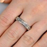 A baguette-cut diamond full eternity ring.Estimated total diamond weight 3cts,