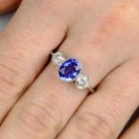 A sapphire and brilliant-cut diamond three-stone ring.Sapphire calculated weight 1.80cts,