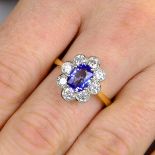 A sapphire and brilliant-cut diamond floral cluster ring.