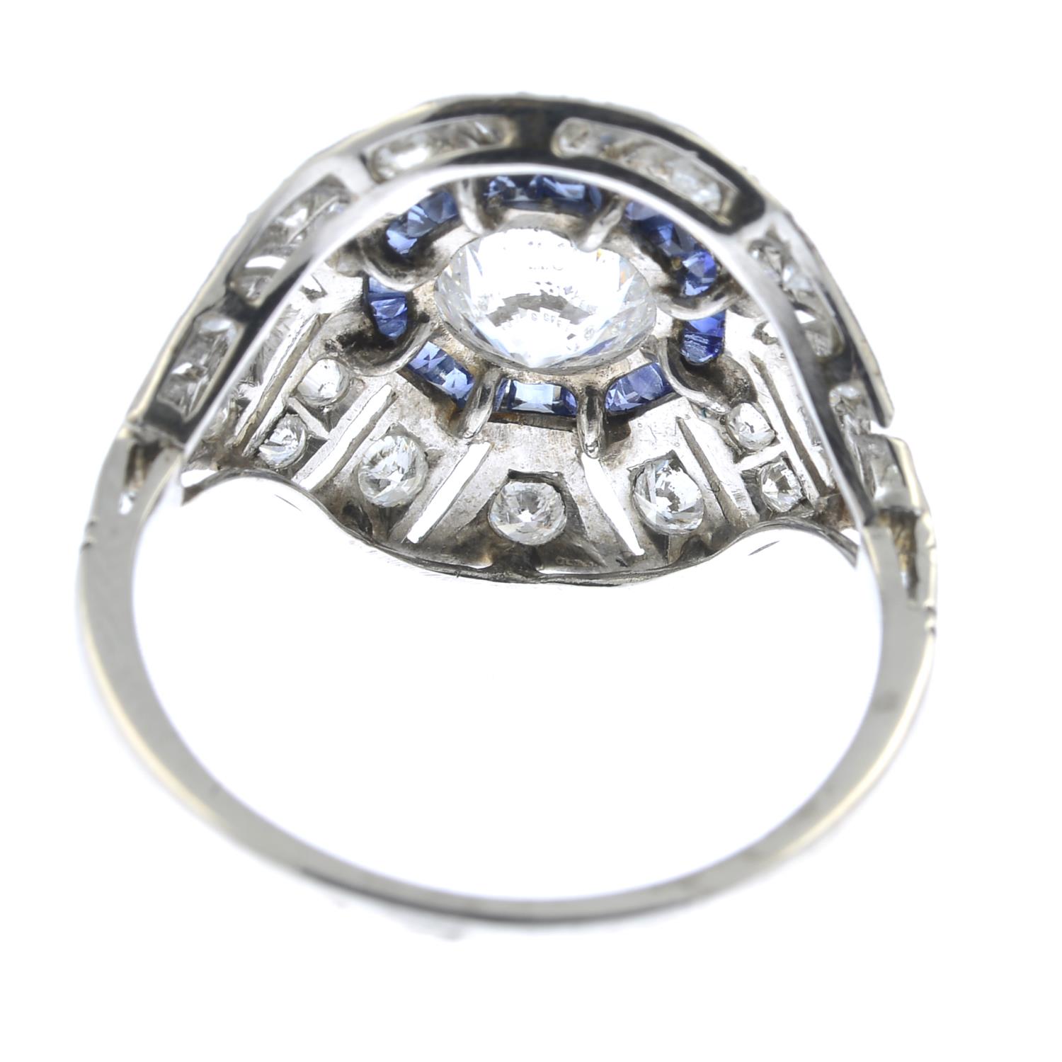 A brilliant-cut diamond and sapphire cluster ring.Principal diamond estimated 1ct, - Image 3 of 5